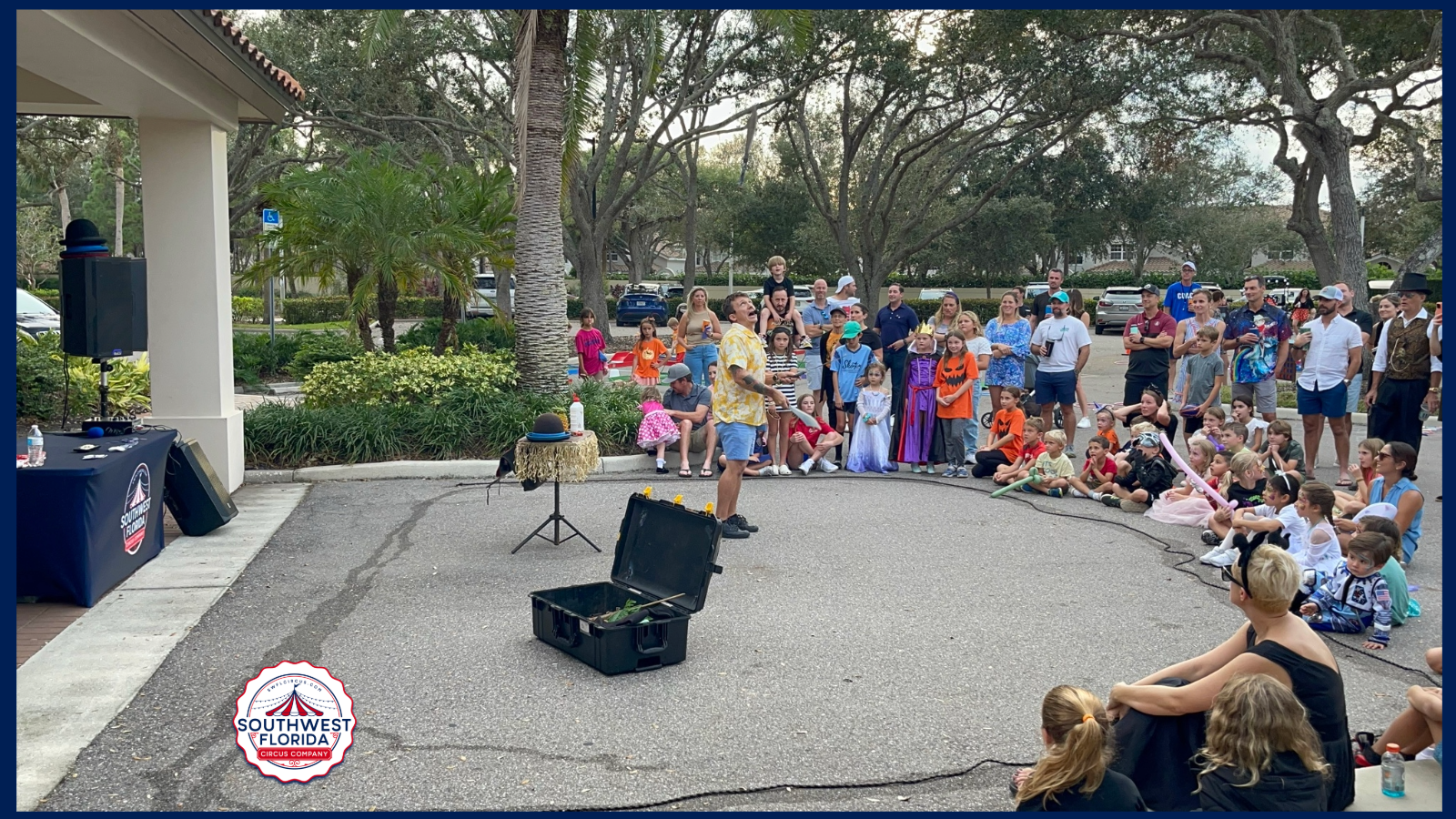 Festival Showtime Experience 3 Juggler Performing At Ground Level For An Outdoor Audience Of Children And Adults.